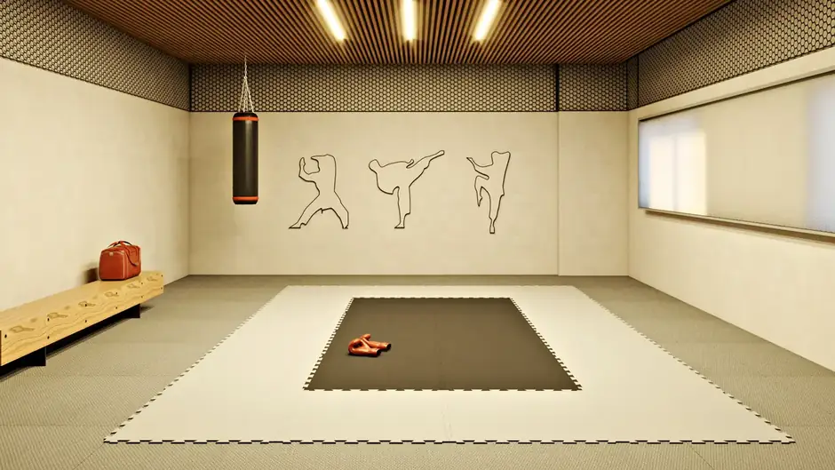 Sala de artes marciais com tatame e saco de pancadas