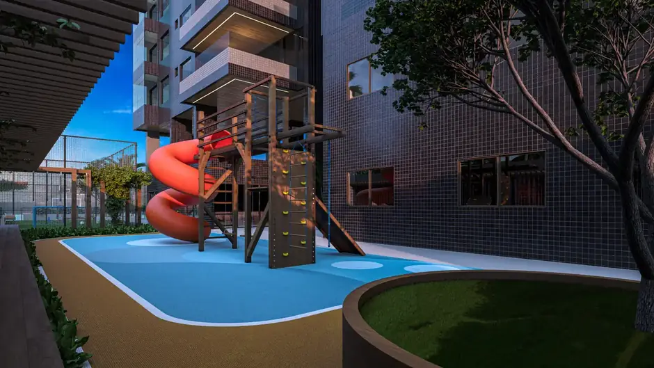 Playground do Algarve Residence com escorregador e parede de escalada